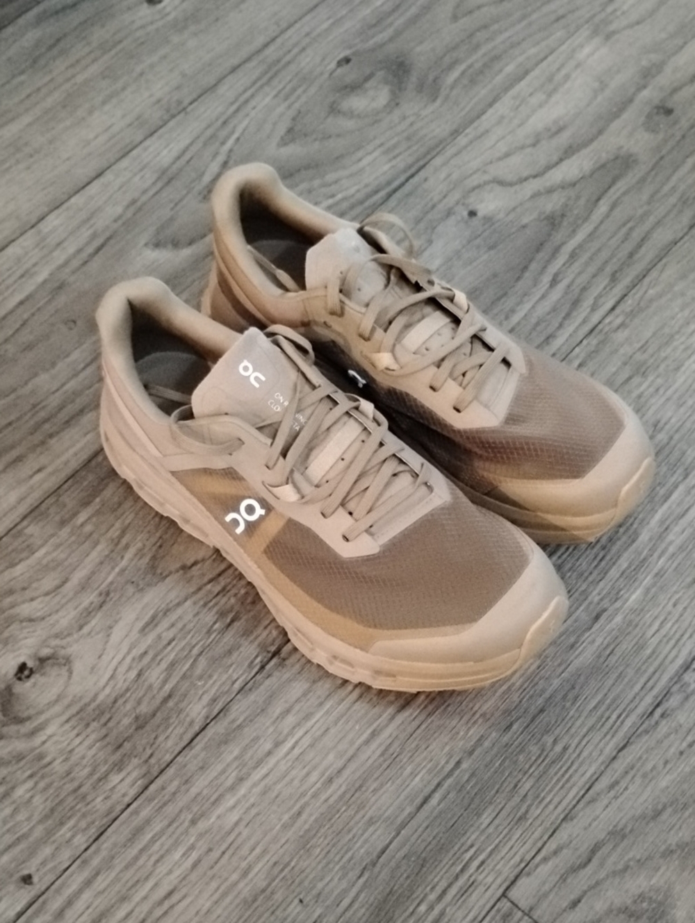 On Running beige suede sneaker interior with QR label